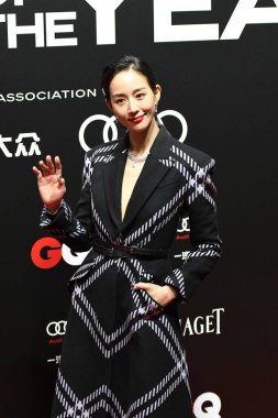 Taiwanese actress Janine Chang, also known as Chang Chun-ning, shows up in black coat at the red carpet for the GQ Men of The Year 2020, Shanghai, China, 4 December 2020.   clipart