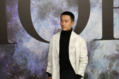 Chinese actor Huang Xuan attends the Dior Men's 2021 Fall Event in Beijing, China, 8 December 2020. clipart