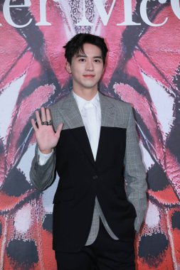 Chinese actor and singer-songwriter Xu Weizhou, known internationally as Timmy Xu, attends an activity of McQueen in Shanghai, China, 16 December 2020.         clipart