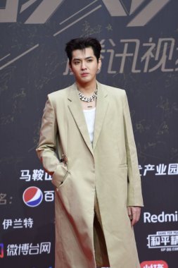 Chinese-Canadian actor, rapper, singer, record producer, and model Wu Yi Fan, known professionally as Kris Wu at the red carpet for the 2020 Tencent Video Star Awards in Nanjing City, east China's Jiangsu Province, 20 December 2020.  clipart