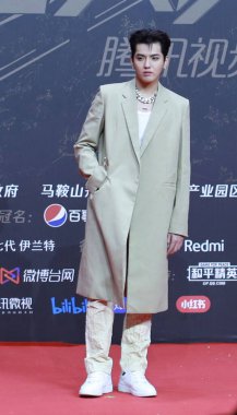 Chinese-Canadian actor, rapper, singer, record producer, and model Wu Yi Fan, known professionally as Kris Wu at the red carpet for the 2020 Tencent Video Star Awards in Nanjing City, east China's Jiangsu Province, 20 December 2020.  clipart