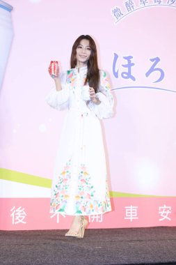 Taiwanese singer and actress Hebe Tien stands for a promotional event in Taipei City, Taiwan, 29 December 2020. clipart