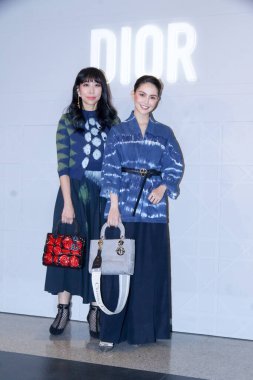Taiwanese Australian actress and model Hannah Quinlivan, also known as Jen Wu and Kun Ling, who is the wife of Taiwanese singer Jay Chou, attends an opening ceremony for Lady Dior in Taipei City, Taiwan, 13 January 2021. Bag: Dior clipart