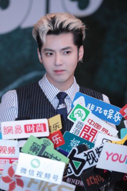 Chinese-Canadian actor, rapper, singer, record producer, and model Wu Yi Fan, known professionally as Kris Wu, attends a campaign for luxury brand Louis Vuitton in Shanghai, China, 8 July 2021. clipart