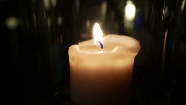 Candle flame on a black — Stock Video