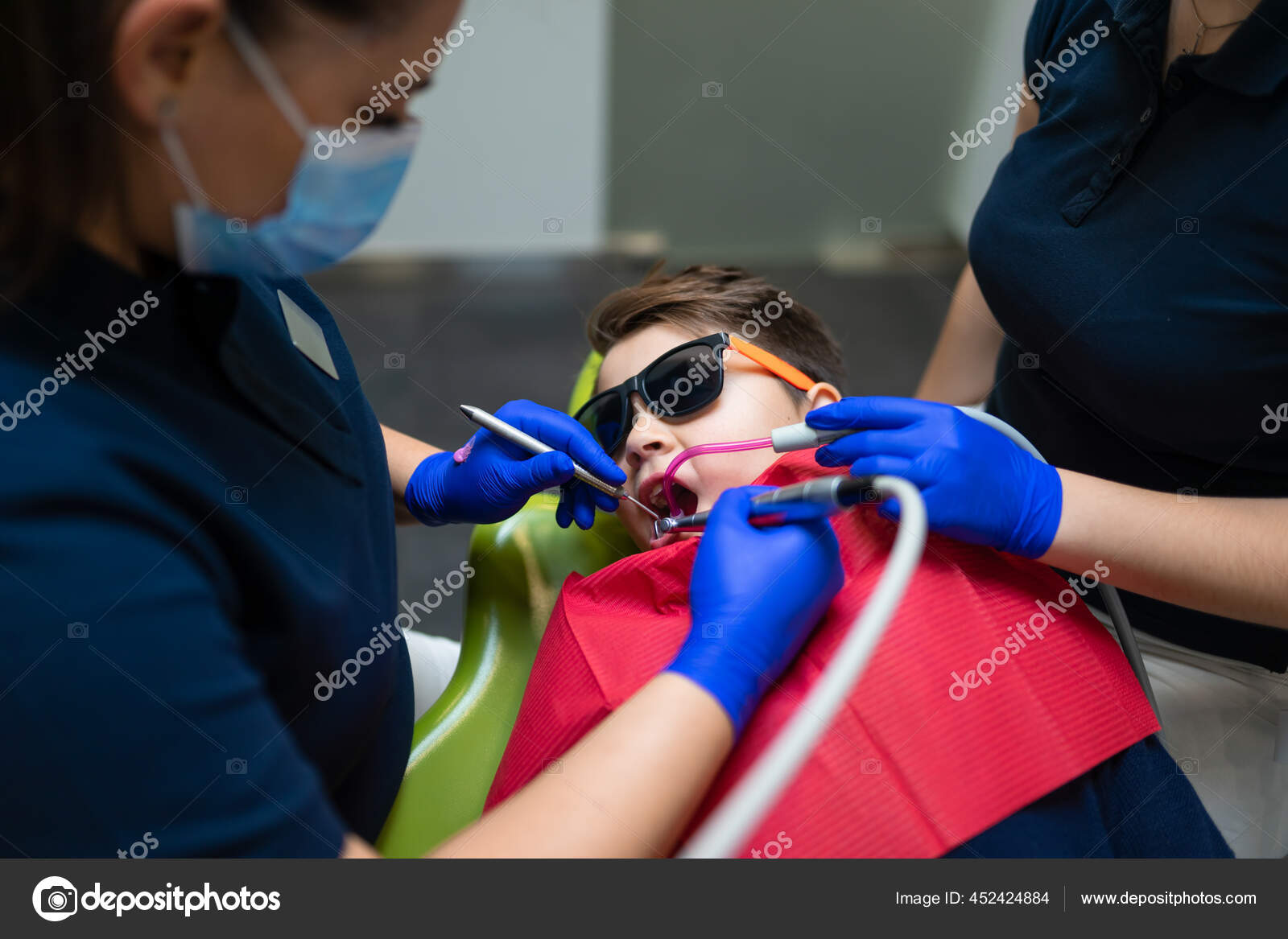 Dentist Assistant Make Preventive Dental Plaque Cleaning Teenager Stock