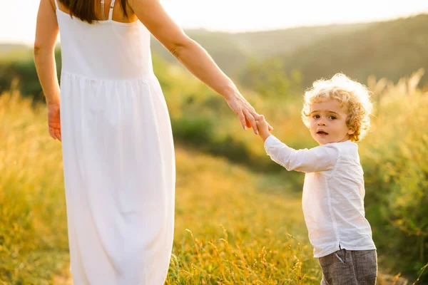Mother Beautiful White Dress Curly Haired Boy Walking Holding Hand — Stock Photo, Image