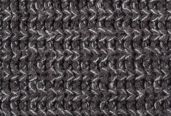 melange background. Knitted textured background of woolen threads of different colors and patterns