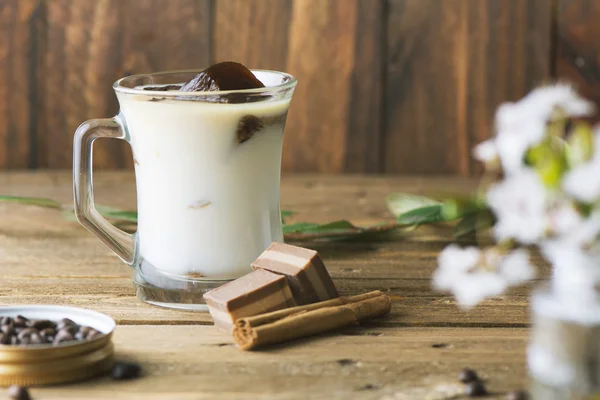 Mug of ice coffee with milk — Stock Photo, Image