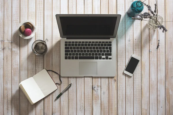 Desktop mix on a wooden office table.