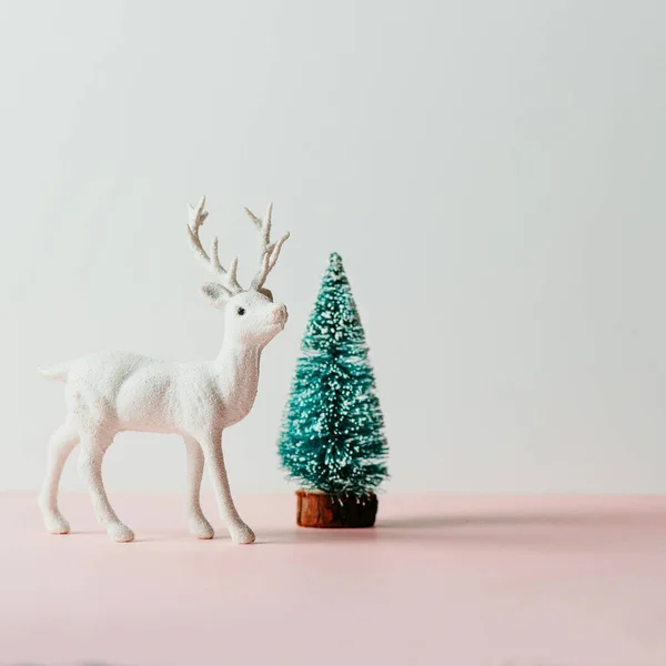 White Reindeer Toy Pine Tree Figurine Pink Background Christmas New — Stock Photo, Image