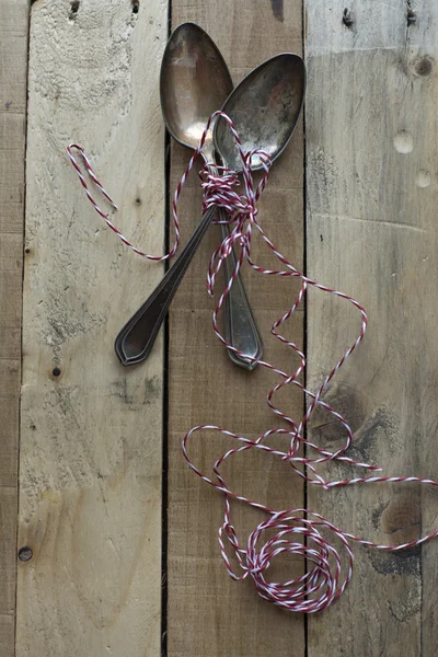 Vintage metal spoons, on wooden background — ストック写真