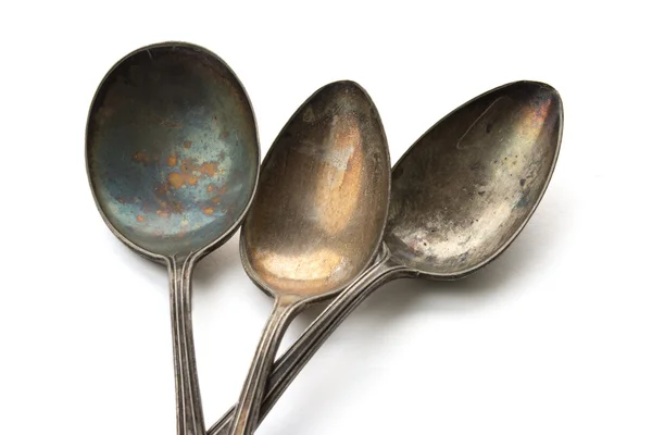 Three old spoons on Isolated background — Stock Photo, Image