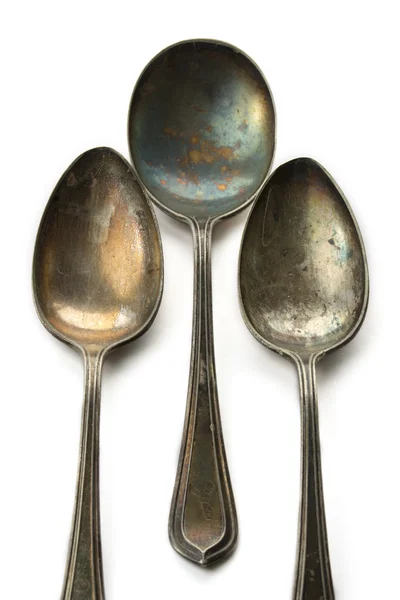 Three old spoons on Isolated background — Stock Photo, Image