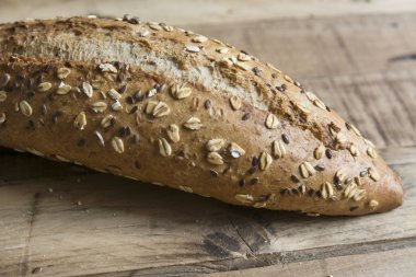 tohumlar ve fındık, ahşap grunge arka plan üzerinde ile ekmek