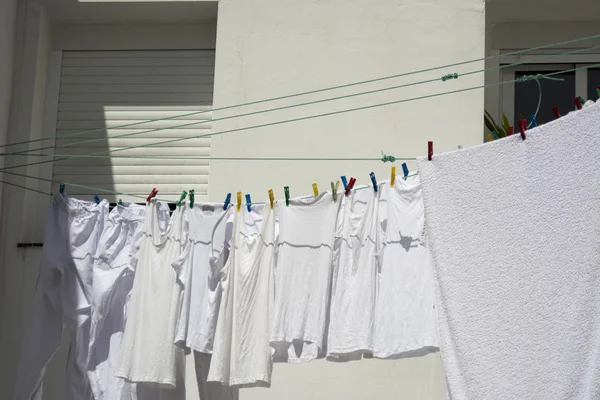 Laundry drying on the rope outside — Stock Photo, Image