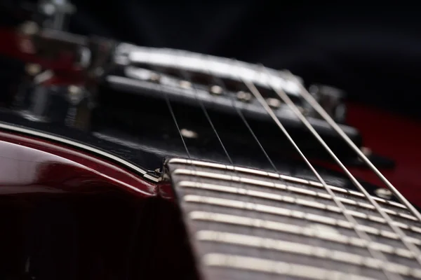 Closeup of old electric guitar. Detail, selective focus. — Stock Photo, Image