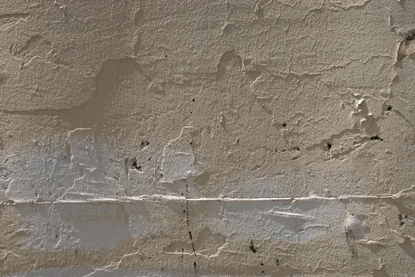 灰色の石膏 グランジ 塗装された部分を持つ古い壁をかすむ Close — ストック写真