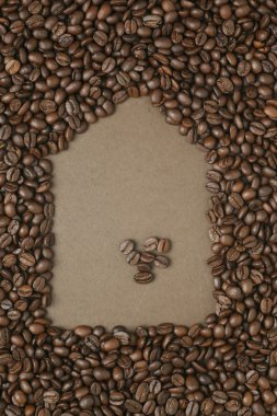 Caffe baskı, eski kahverengi kağıt üzerinde kahve çekirdekleri