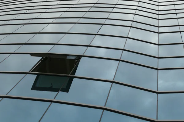 Reflection in windows of modern office building — Stock Photo, Image