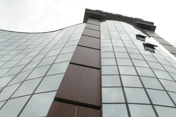 Reflection in windows of modern office building — Stock Photo, Image