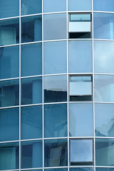 Reflection in windows of modern office building — Stock Photo, Image