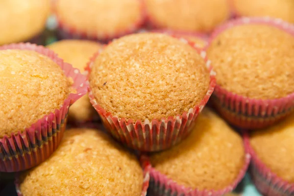 Background pink cupcakes in the shape of Stock Photo