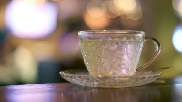 Hot water in glass tea cup — Stock Video