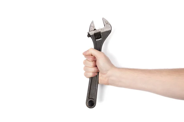 Närbild av en Spanner skiftnyckel isolerad på en vit bakgrund, Man hand hålla Spanner skiftnyckel — Stockfoto