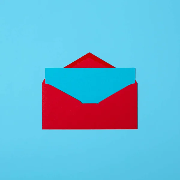 Blank blue card with red envelope isolated on blue background. Template or mock up. Banner with copy space