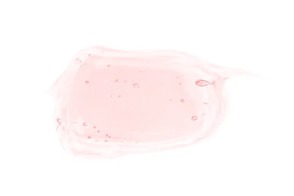 白色の背景に分離されたクリアライトピンクの液体長方形ゲルスミア。最上階だ。ボディ&フェイスケアスパの化粧品のコンセプト。透明セラムの質感 — ストック写真