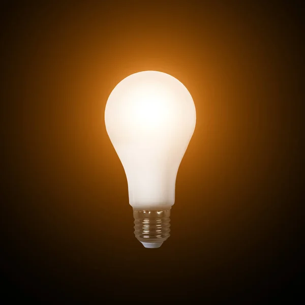 Turn on bright LED lamp isolated on black background. LED bulb close up. Idea concept — Stock Photo, Image