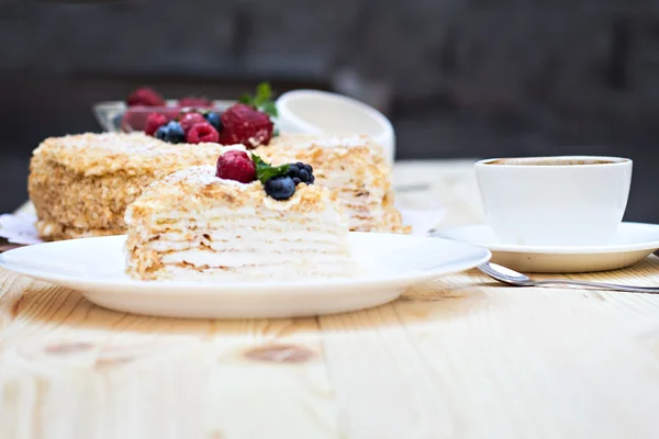 Napoleon cake  and a cup of coffee — Stock Photo, Image