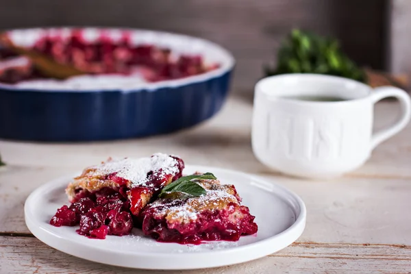 Cherry pie and a cup of tea — Stock Photo, Image