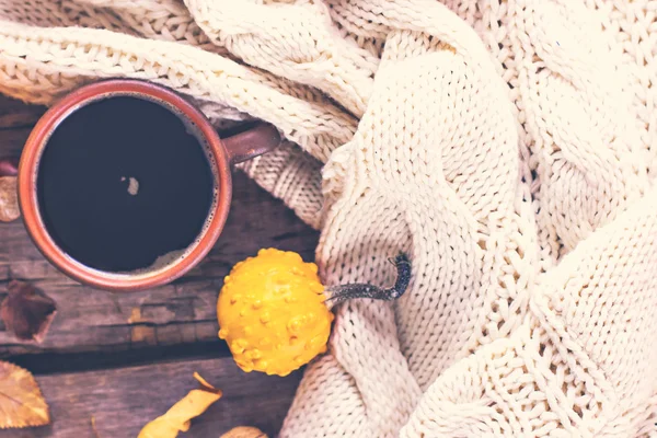 Cup of coffee, pumpkin, autumn leaves