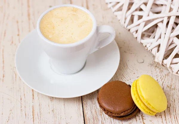 A cup of coffee "espresso" and  macaroon. toned photo — Stock Photo, Image