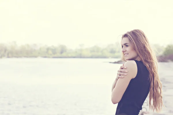 Portrait of young beautiful blonde girl. Outside. Stay near water — Stock Photo, Image