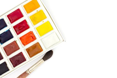 Workplace artist - paper, paint, brushes, color wheel. Mock up.