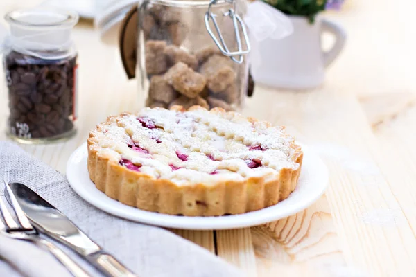 Homemade pie with coffee on a wooden background — Stock Photo, Image