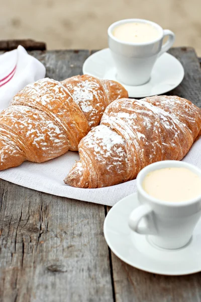 A cup of coffee "espresso" and croissant — Stock Photo, Image