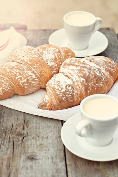 A cup of coffee "espresso" and croissant — Stock Photo, Image