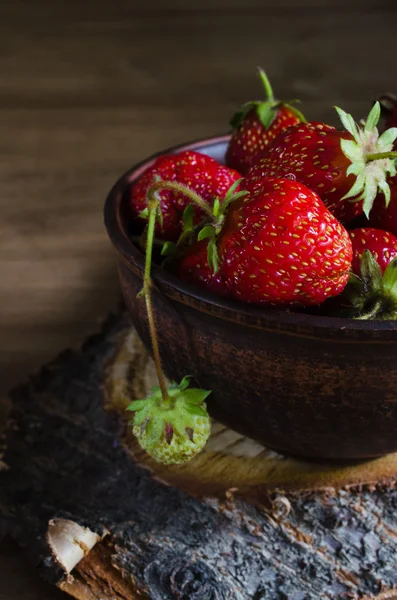 Fresh ripe organic strawberry on wooden background. Rustic style. — Stock Photo, Image