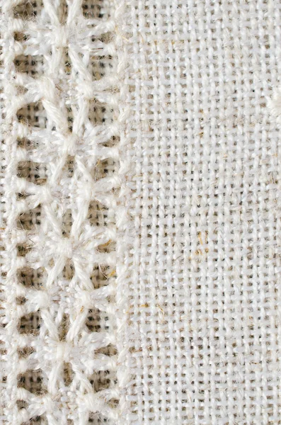 Modello di ricamo per sfondo o copertina. Texture del tessuto di lino vintage homespun. Orlo punto . — Foto Stock