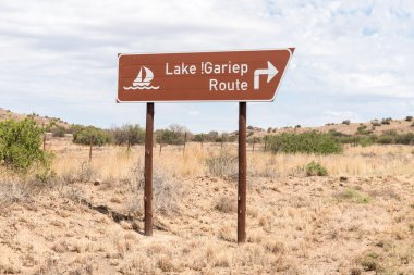 Road sign for the scenic route along the Gariep Dam clipart