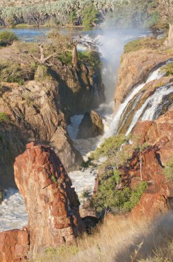 Epupa waterfalls in on the border of Angola and Namibia clipart
