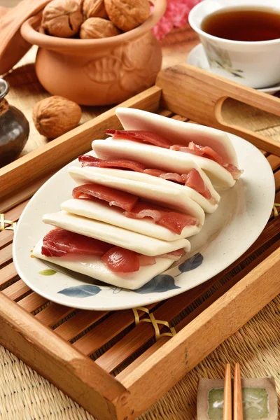 Honey ham wrapped in thin bread — Stock Photo, Image