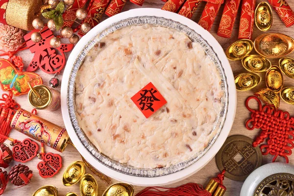 Steamed turnip cake, Chinese new year food (the Chinese words is \'make money\', not a logo or trademark.)