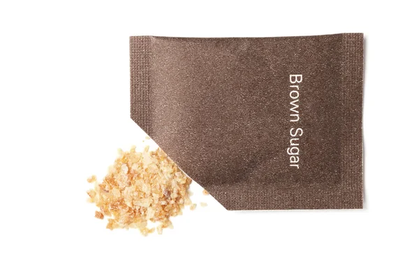 Brown sugar packet — Stock Photo, Image