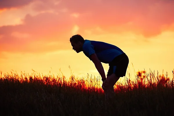 Läufer bei Sonnenuntergang — Stockfoto