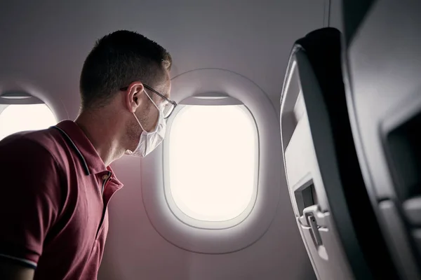 Passenger Protective Face Mask Airplane Looking Window Themes Traveling New — Stock Photo, Image